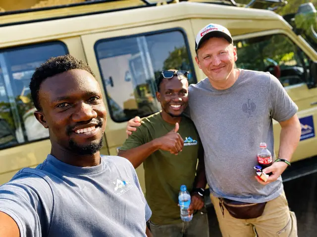 Smiles all round at the safari vehicle