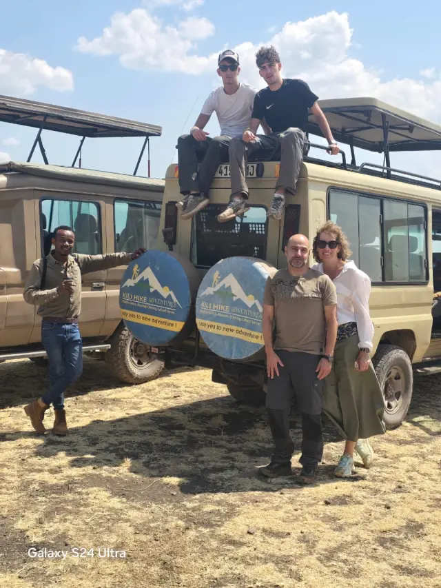 Guests with their guide on safari