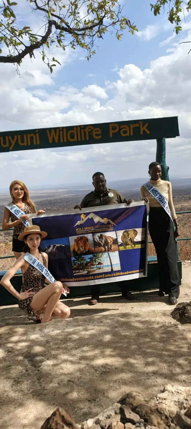 Flying the Kili Hike Adventures flag at a wildlife park lookout