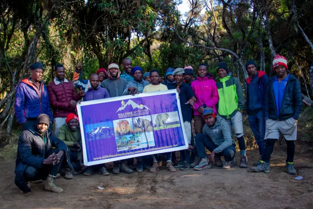 A big group and our flag on the mountain